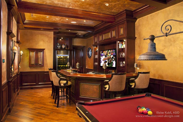 The game room features reclaimed hand-scraped wood flooring, burnished LusterStone and a club bar.