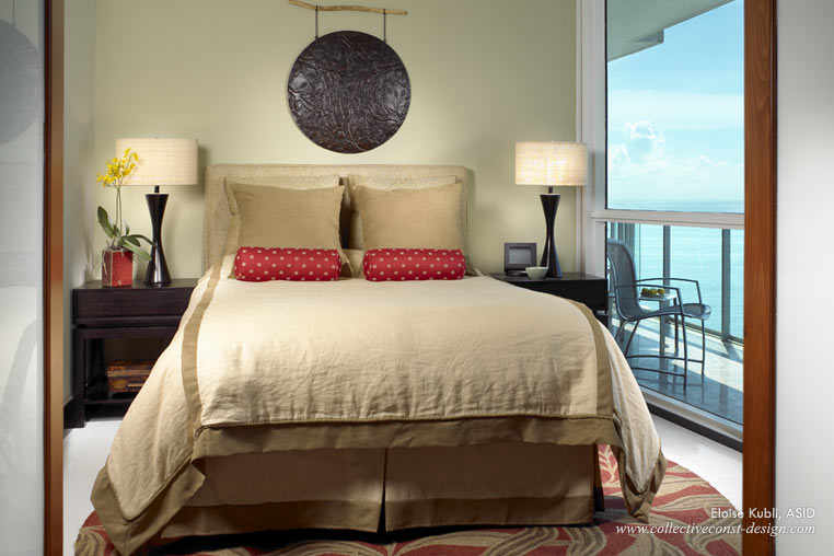 The guest Bedroom opens to the balcony that features a large onyx inset bordered with mosaics. Patio chairs by Brown Jordan allow for sunrise and sunset enjoyment.