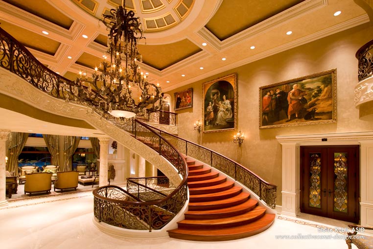 In the grand hall, sparkle reverberates off the Brazilian Cherry Jatoba hardwood banister and artwork from the Private Collection of Ebanista as the luster from the checkerboard pattern of brushed and polished Crema Marfil marble flooring leads the way through double library doors inset with McMow&rsquo;s leaded art glass.