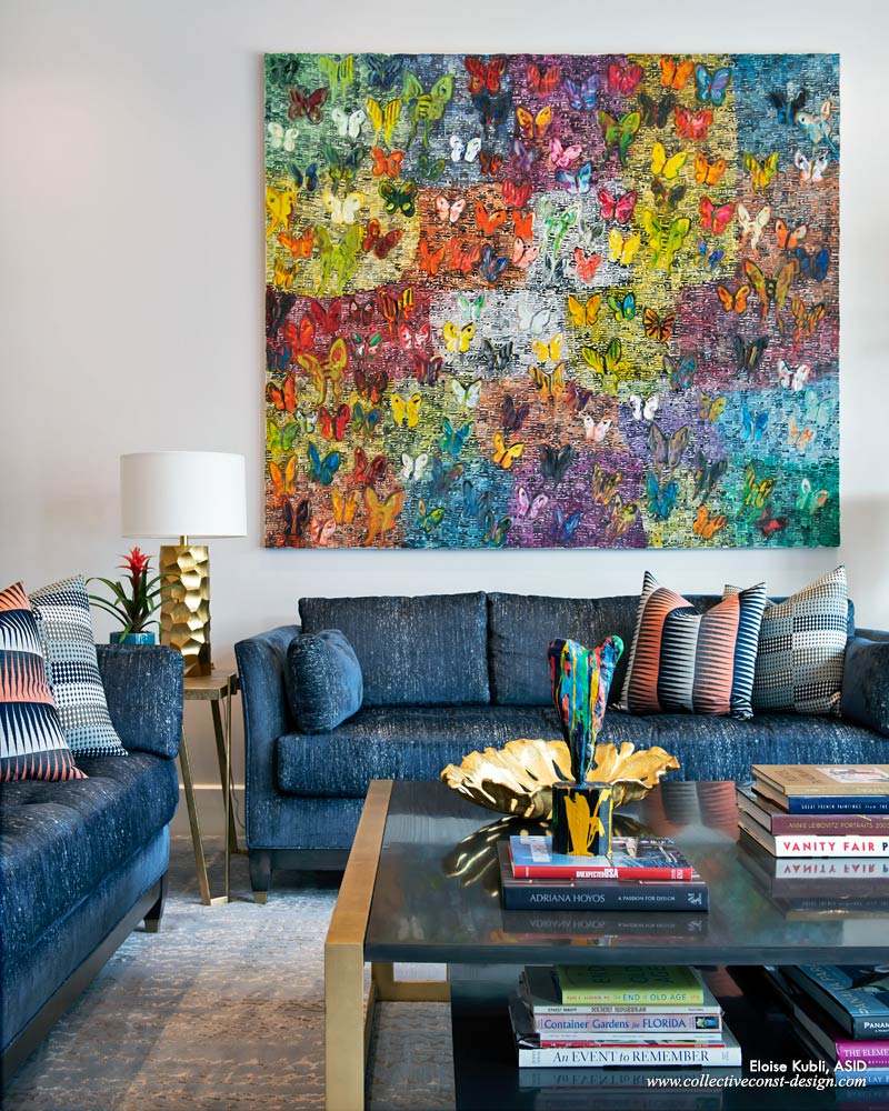 The home owner&rsquo;s artwork was a determining factor in both the layout and color scheme of the room. Featuring a work from Hunt Slonem&rsquo;s <em>Butterflies</em> series, Eloise notes that one of her favorite quotes by the artist is &ldquo;Butterflies are a sign of growth and change.&rdquo; Privacy and sunlight are controlled by a Crestron motorized roller shade system. An ice blue rug adds texture to the family room&rsquo;s floor.