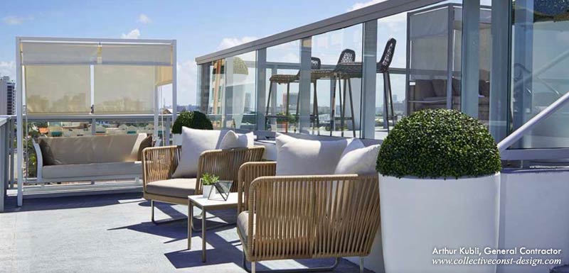 Semi-private cabanas and seating areas are arranged on different levels. Stainless steel and glass railings add elegance and a sculpted feel.