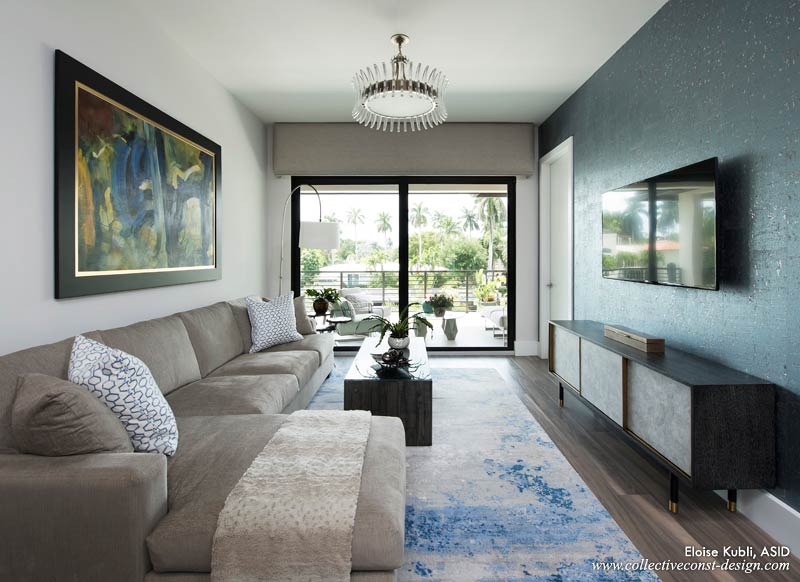 Cork wallpaper tinted deep blue with underlying silver accents. On the floor, a wool rug in shades of gray, white and blue is a perfect complement. <a href='http://faramir/collective/projects/gold-coast-from-the-ground-up-design.php?pv=Ground'>See more of this project</a>.