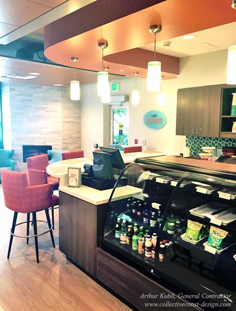 The new design features a new counter and serving area, new dining tables and chairs, and upgraded aesthetics, including walls, ceilings, and floors.