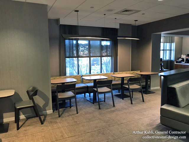 Addional lighting and the use of adaptive furniture and design elements serve to create an atmosphere of productivity for business-class patrons.