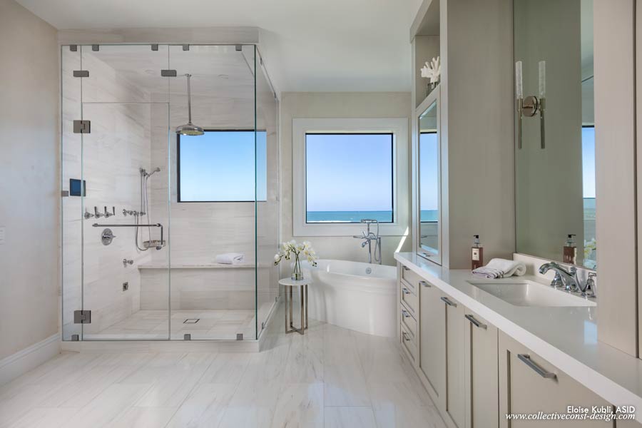 Grey hand-glazed cashmere cabinetry with conversion polyurethane adds soft contrast to the white and grey Dolomite marble.