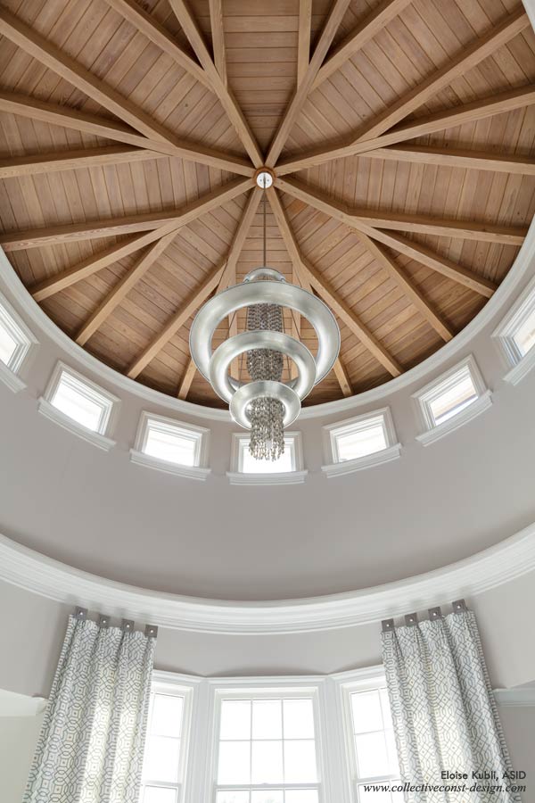 The 36-foot high oculus is the dramatic entry to the private master suite. A new color scheme, simple panels on pegs and silver leafed crystal chandelier creates the updated classic style. The oculus chandelier is finished in silver leaf with six feet of Crystal beaded chains. 