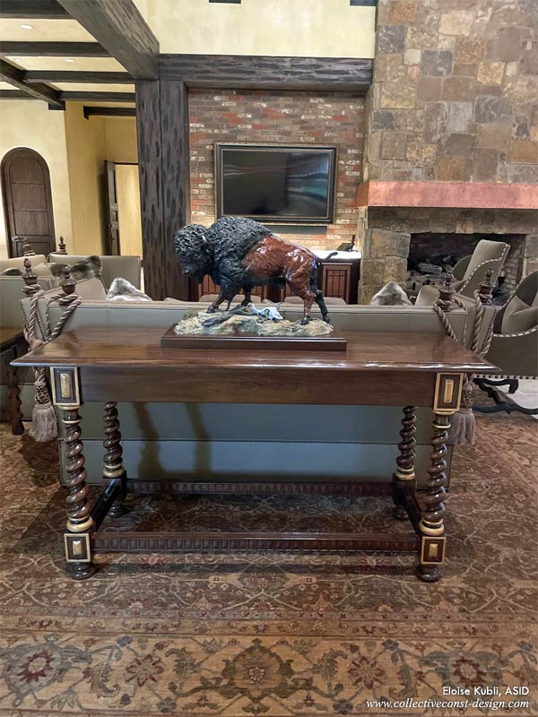 Unique bison sculpture on side table in the great room.